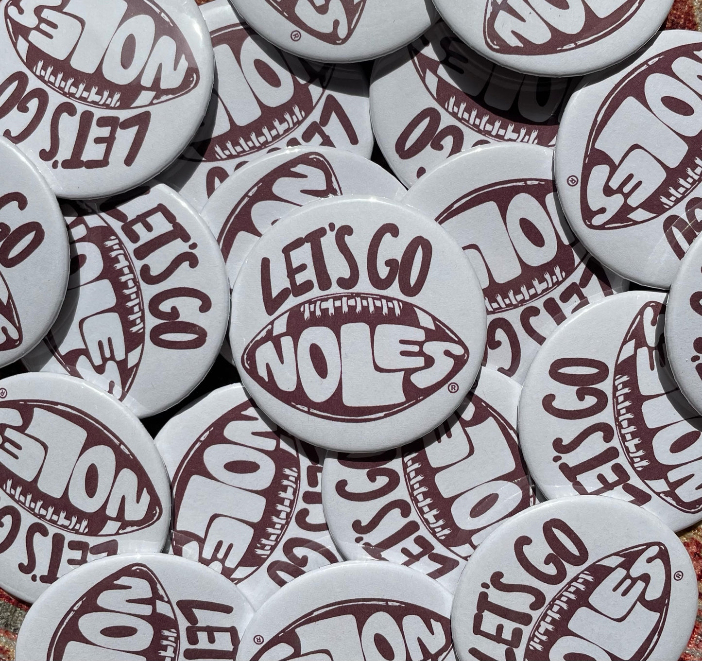 "LET'S GO NOLES" button