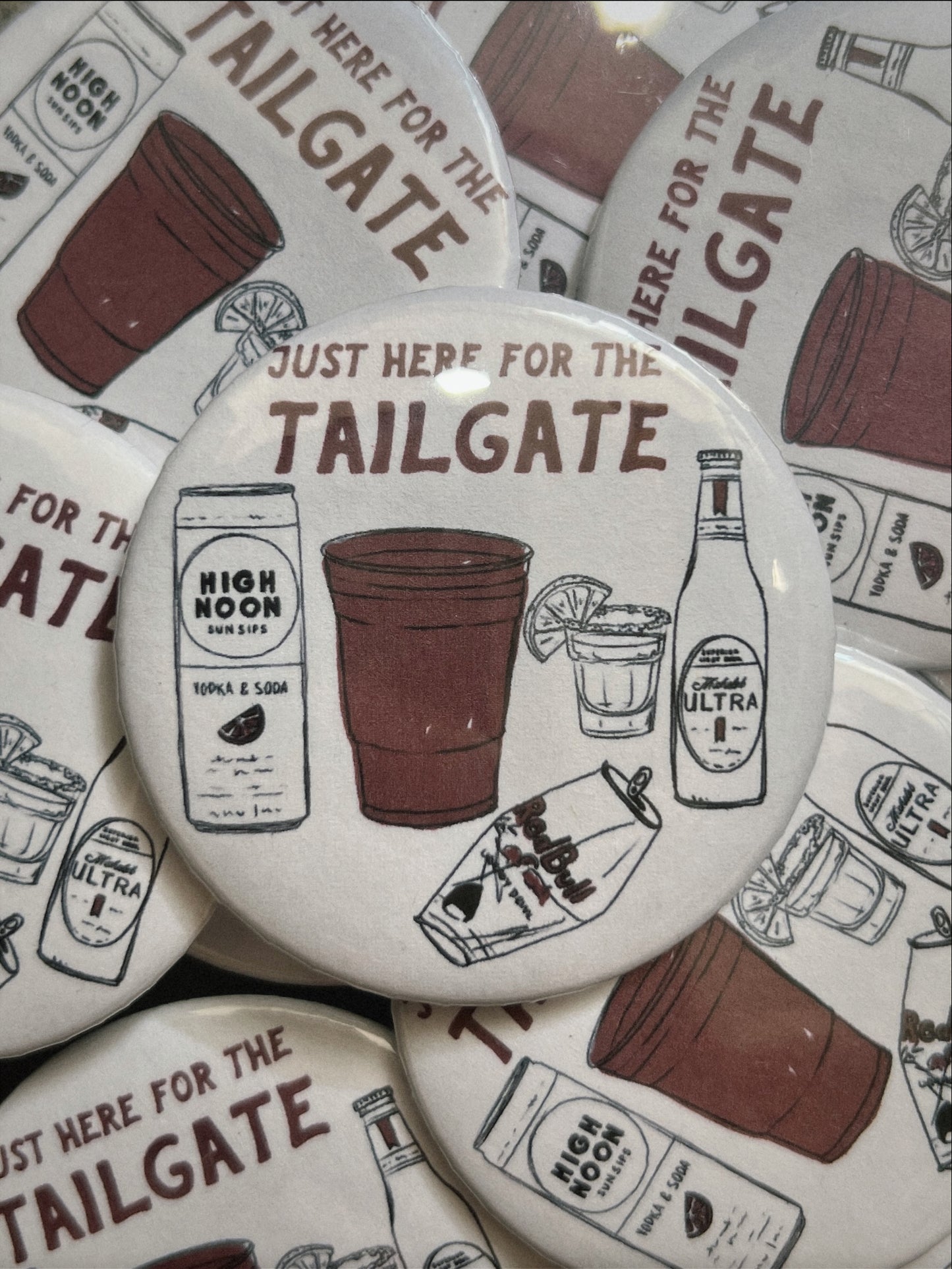 "JUST HERE FOR THE TAILGATE" button